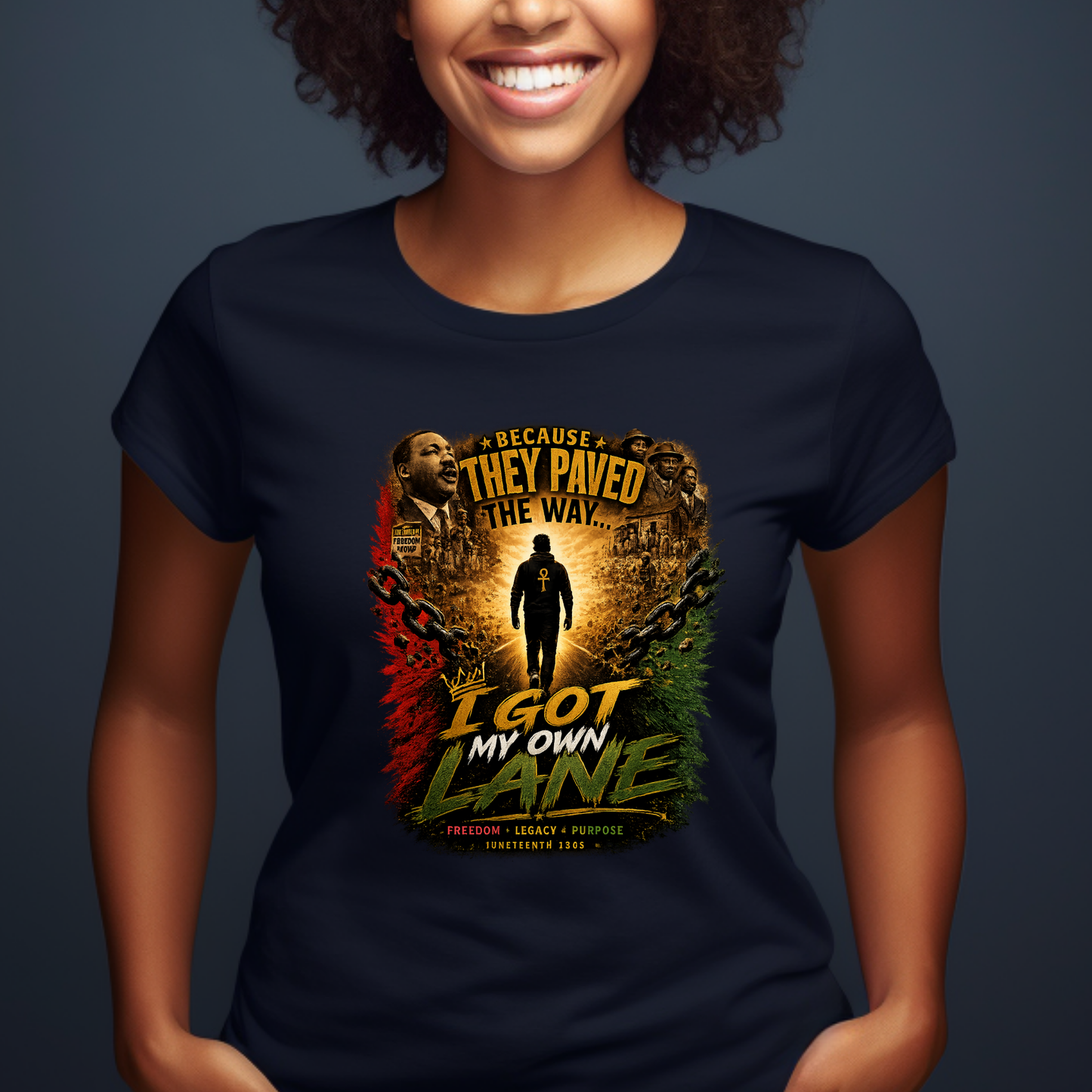 Woman wearing Because They Paved The Way Juneteenth graphic tee on a black t-shirt