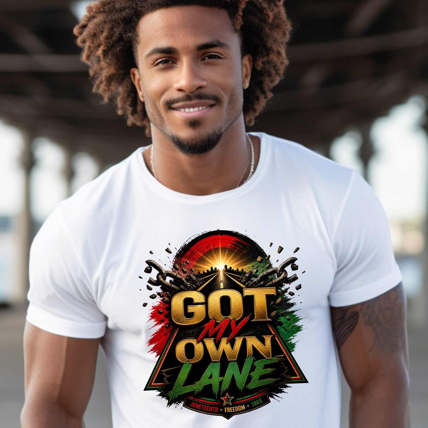 Model wearing Got My Own Lane Freedom Road graphic tee on a white t-shirt