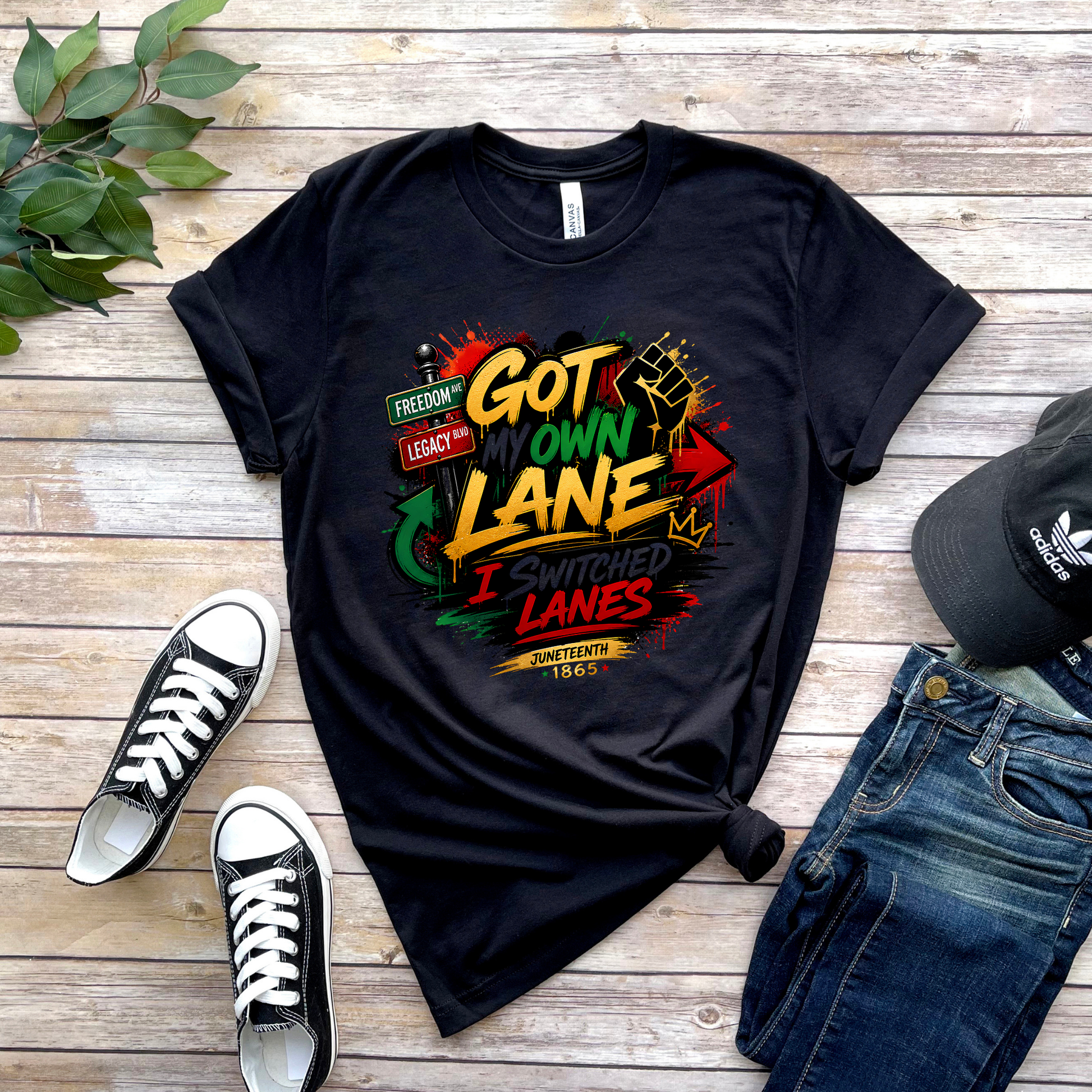 Got My Own Lane I Switched Lanes graphic displayed on a black t-shirt flat lay mockup