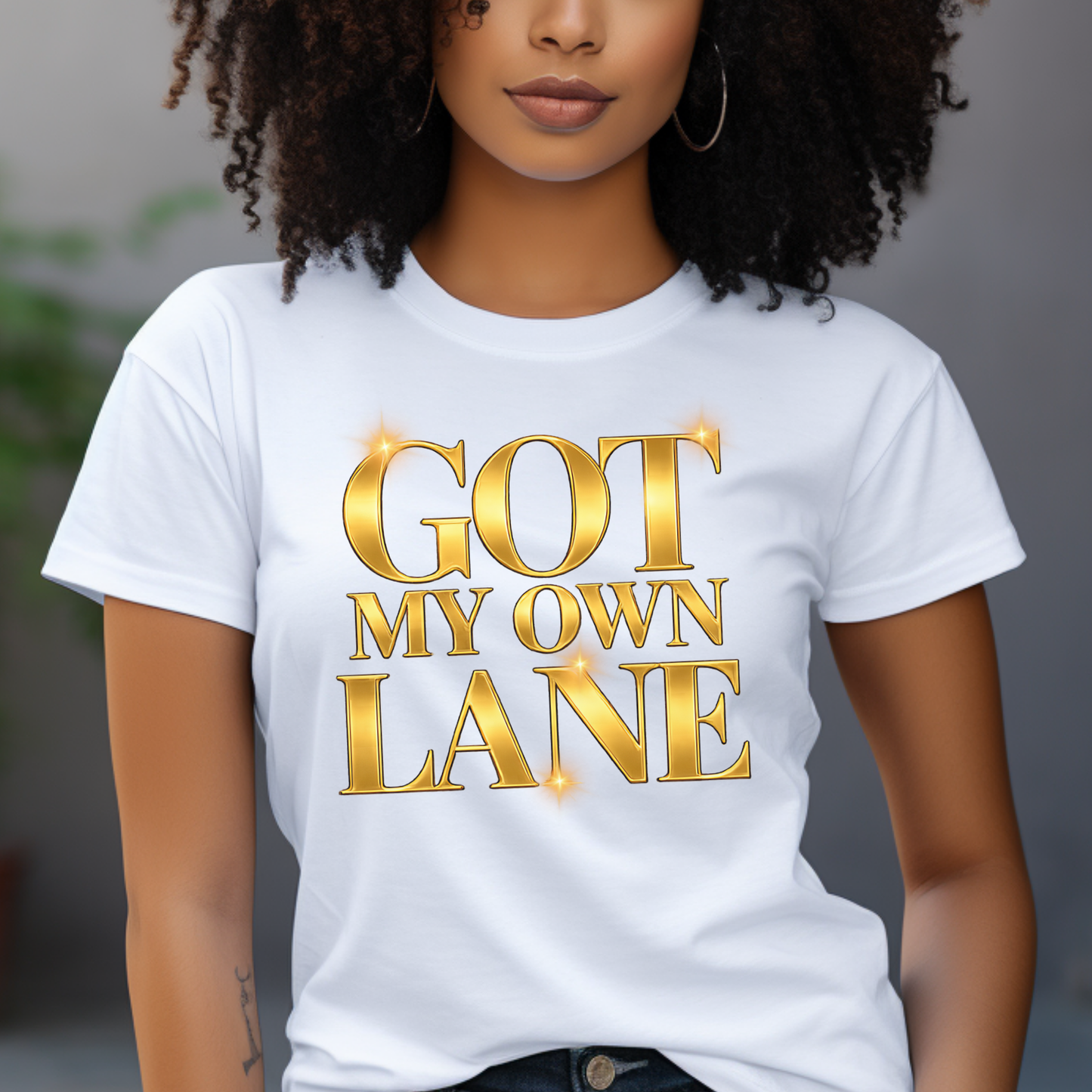 Woman wearing Got My Own Lane Signature Gold logo tee on a white t-shirt