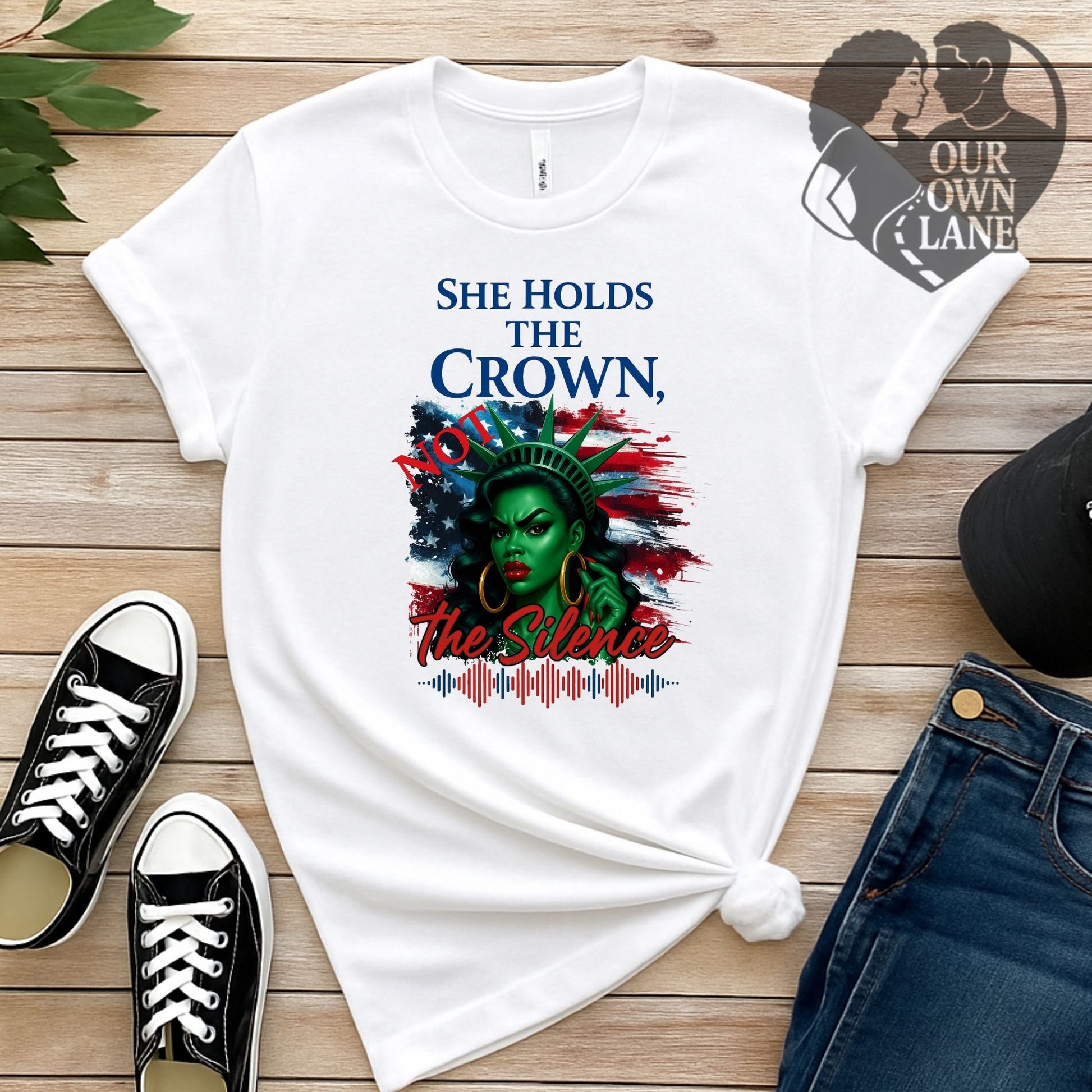 White unisex t-shirt featuring She Holds the Crown Not the Silence empowerment graphic by Our Own Lane